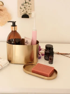 Porte savon pour cuisine ou salle de bain en métal doré.