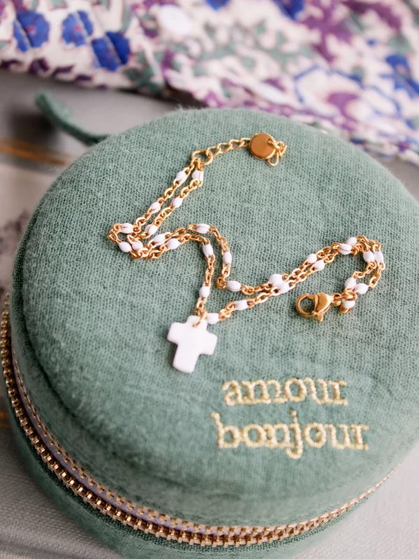 Bracelet croix blanche, chaine double dorée